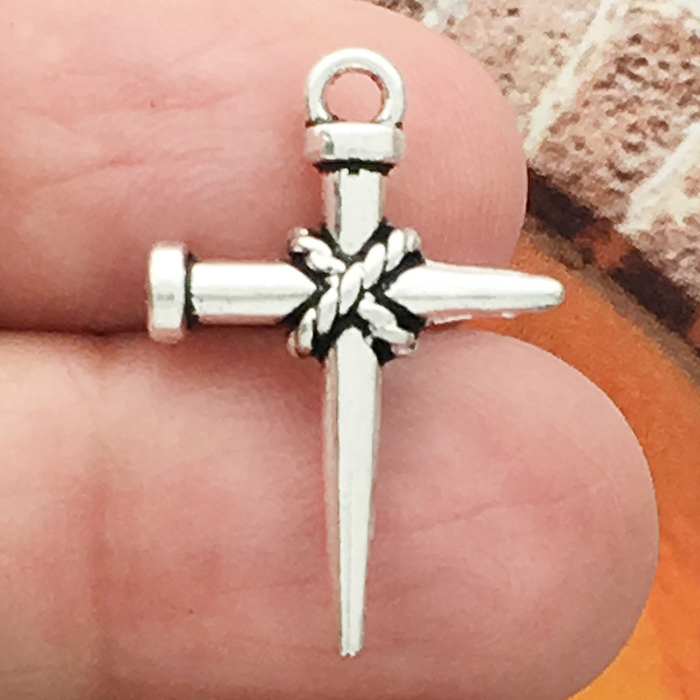 NAIL Cross Charm with Rope Tie in Silver Pewter Small