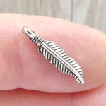 Silver Feather Charms Wholesale Tiny in Antique Pewter