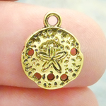 Tiny Sand Dollar Charms Wholesale in Antique Gold Pewter