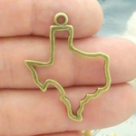 Outline Texas Charms Wholesale in Bronze Pewter 